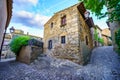 Beautiful stone houses and narrow alleys in the medieval village of Peratallada, Girona, Spain. Royalty Free Stock Photo