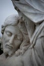 Close up of Jesus`s face with eyes closed, Victorian cemetery statue. Royalty Free Stock Photo