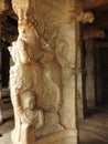 Beautiful stone pillars with god and goddess carving in Veerabhadra Hindu temple located at Lepakshi in the state of Andhra