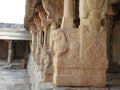 Beautiful stone pillars with god and goddess carving in Veerabhadra Hindu temple located at Lepakshi in the state of Andhra