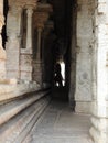 Beautiful stone pillars with god and goddess carving in Veerabhadra Hindu temple located at Lepakshi in the state of Andhra