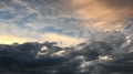 Beautiful stormy sky with clouds background. Dark sky with clouds weather nature cloud storm. Dark sky with clouds and sun.