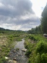 Beautiful streams, green trees and clear sky