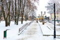 A beautiful street or alley in the park covered with snow after a snowfall. A city after a snowstorm. Beautiful lanterns and Royalty Free Stock Photo