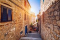 Beautiful street with flowers in the Hvar town, Hvar island, Dalmatia, Croatia. Old Mediterranean street, Hvar town. Old Adriatic Royalty Free Stock Photo