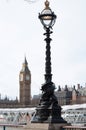 Beautiful street lamp in Westminster, London, with the big ben and parliament houses in the background. United Kingdom Royalty Free Stock Photo