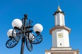 Beautiful street lights near the city hall, illuminated by sunlight