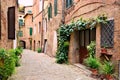 Street in the medieval old town of Siena, Tuscany, Italy Royalty Free Stock Photo