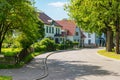Beautiful street with modern residential houses in summer sunny Royalty Free Stock Photo