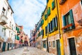 Beautiful street with old colorful architecture in Venice, Italy