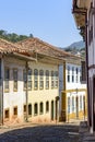 Beautiful street with old colorful houses in colonial architecture Royalty Free Stock Photo