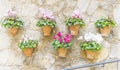 Beautiful street in Valldemossa with traditional flower decoration, famous old mediterranean village of Majorca. Balearic island Royalty Free Stock Photo