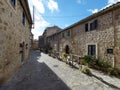 Beautiful street in Valldemossa with traditional flower decoration, famous old mediterranean village of Majorca Spain Royalty Free Stock Photo