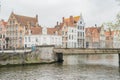 Beautiful street view with bridge and river of the Brugge city Royalty Free Stock Photo