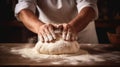 Beautiful and strong mens hands knead the dough make bread, pasta or pizza. Powdery flour flying into air. chef hands Royalty Free Stock Photo