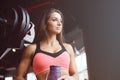 Strong athletic young girl working out in gym Royalty Free Stock Photo