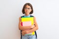 Beautiful student child girl wearing backpack glasses books over isolated white background with a confident expression on smart Royalty Free Stock Photo