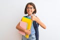 Beautiful student child girl wearing backpack glasses books over isolated white background happy with big smile doing ok sign, Royalty Free Stock Photo