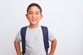 Beautiful student kid boy wearing backpack standing over isolated white background with a happy and cool smile on face Royalty Free Stock Photo