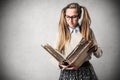 Beautiful student reading a book