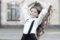 beautiful student teen girl has long hair. cute smiling confident schoolgirl jumping. sense of freedom. back to school Royalty Free Stock Photo