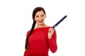 Beautiful student woman pointing up with a big pencil Royalty Free Stock Photo