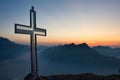 beautiful Stunning sunset with cross on top of mountain peak Switzerland Royalty Free Stock Photo