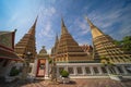 Beautiful stupas decorated with colorful mosaic big pagoda and Thai art architecture of Wat Pho temple in Bangkok, Thailand Royalty Free Stock Photo