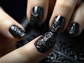 Beautiful style black nail art manicure on female hands