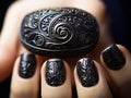 Beautiful style black nail art manicure on female hands