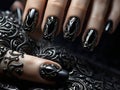 Beautiful style black nail art manicure on female hands