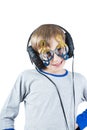 Beautiful stylish blond child wearing big professional headphones and funny glasses Royalty Free Stock Photo