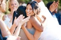 Beautiful stylish bride greeting and socialising with friends and family. Guests congratulating the bride on her wedding Royalty Free Stock Photo