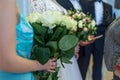 Close-up relatives, friends and acquaintances congratulate the newlyweds on their wedding day. The bride and groom accept gifts Royalty Free Stock Photo