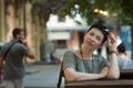 A beautiful stylish middle-aged woman walks around the city. Business women like to walk around the city and think about their Royalty Free Stock Photo