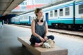 Beautiful stylish modern young woman waiting train Royalty Free Stock Photo