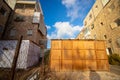 A beautiful sukkah made of wood inside the courtyard of a building