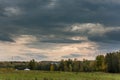 Beautiful summer and autumn landscape. Field and forest at sunset