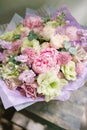 Beautiful summer bouquet. Arrangement with mix flowers. Flower bunch with peony on wooden table. The concept of a flower Royalty Free Stock Photo