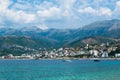 Beautiful summer cloud landscape of beach town of Himare. Adriatic sea. Albania. Concept of summer holidays and relaxation Royalty Free Stock Photo