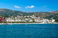 Beautiful summer cloud landscape of beach town of Himare at foot of  mountains on border of Ionian and Adriatic seas. Albania Royalty Free Stock Photo