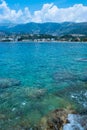 Beautiful summer cloud landscape of beach town of Himare. Adriatic sea. Albania. Concept of summer holidays and relaxation Royalty Free Stock Photo