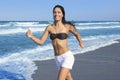 Beautiful summer girl jumping on the beach Royalty Free Stock Photo