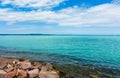 Beautiful summer lake landscape with turquoise water Royalty Free Stock Photo