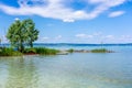 Beautiful summer lake landscape with turquoise water Royalty Free Stock Photo