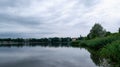 Beautiful summer landscape with architectural elements.Lake overlooking the ancient castle of the Radziwills Nesvizh, Belarus