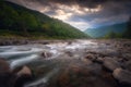 Beautiful summer landscape. Fast flowing mountain river Royalty Free Stock Photo