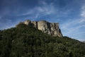 Beautiful summer landscape with green meadow, mountains and blue sky, Bismantova Rock Royalty Free Stock Photo