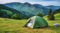 Beautiful summer landscape with mountains, with a tourist tent in the foreground on a sunny day Royalty Free Stock Photo