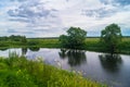 Beautiful summer landscape.Nerl river,illuminated by the setting evening sun Royalty Free Stock Photo